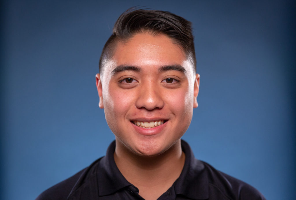 Matthew Morales, Corona High School senior, is also Erika Parker's teacher's assistant.