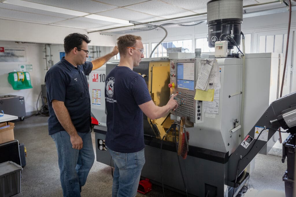 Pierobello learns advanced manufacturing techniques on a Haas CNC lathe.
