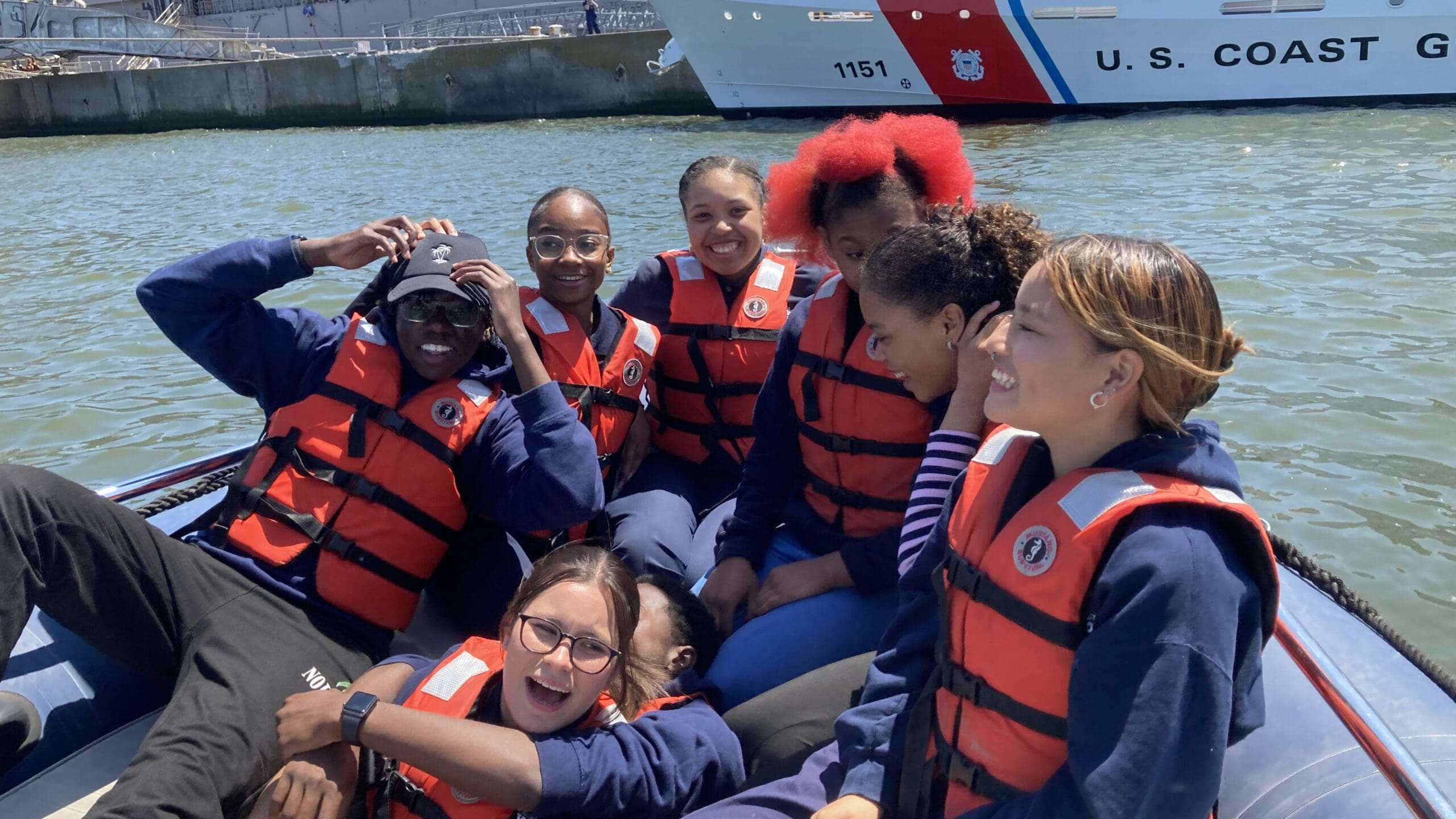 students training through the Urban Assembly NY Harbor School in a small boat
