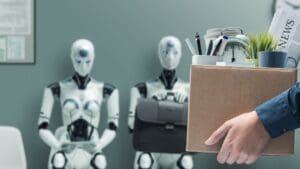 Two AI robots and a fired human worker