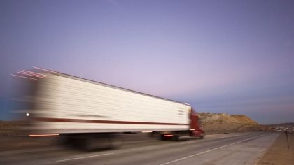 BLURRED SEMI TRAILER TRUCK