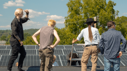 West Virginia workers install a solar panel