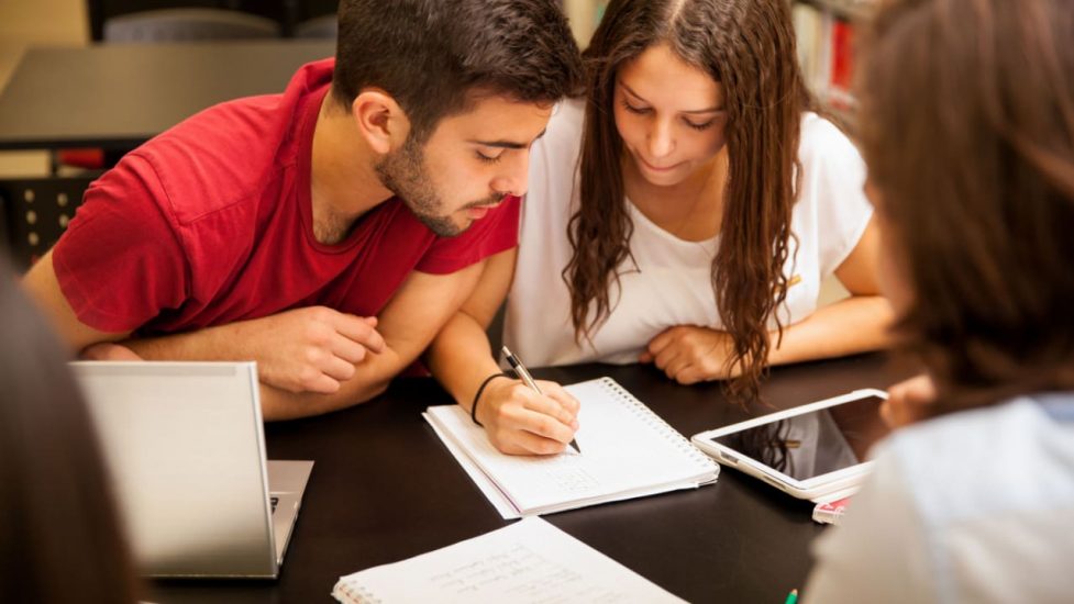HISPANIC STUDENTS STUDYING