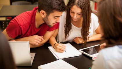 HISPANIC STUDENTS STUDYING
