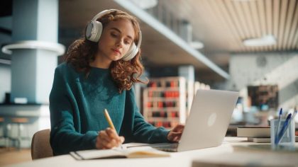 ONLINE LEARNING -WOMAN USING LAPTOP