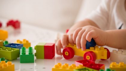 closeup of child's hands in childcare
